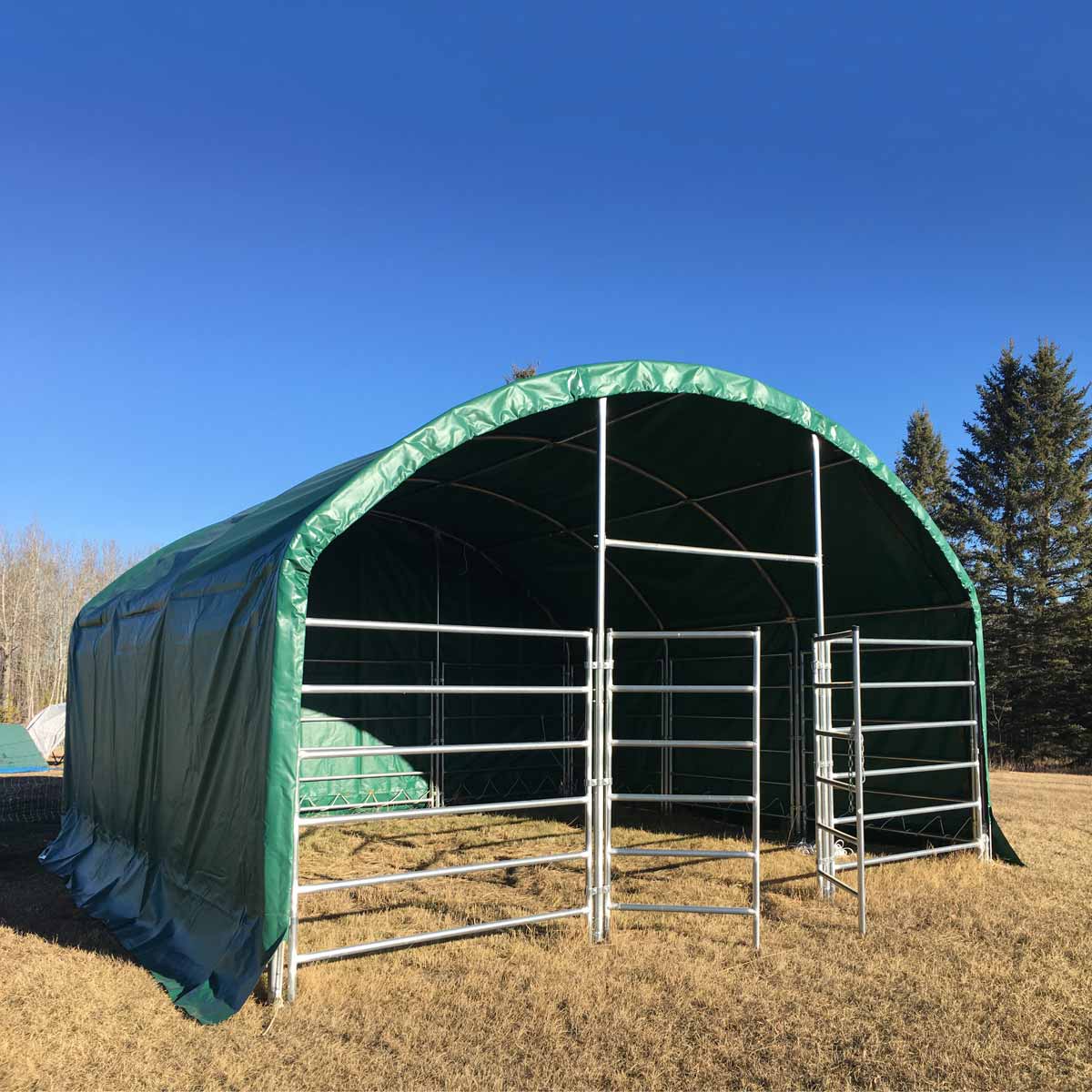 20' x 20' Livestock Corral Shelter, Powder Coated Structure, 12' Dome Roof, 17 oz Military Green PVC Fabric Covering, 6-Bar Corral Panels, 5' Front Swing Gate, TMG-ST2020L
